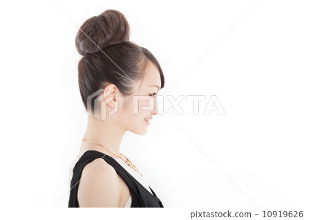 A pretty girl who set hair in a hairdresser in a fashionable dress A pretty girl who set hair in a hairdresser in a fashionable dress 10919626