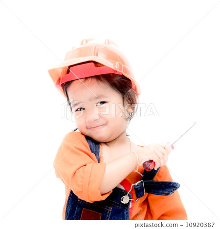 Isolated ngineer baby girl and screw driver in hand 10920387