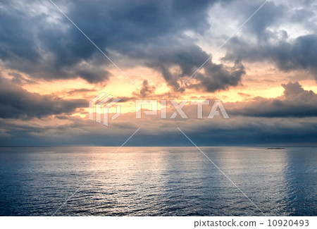 Background with nice blue sky and white clouds over calm sea 10920493