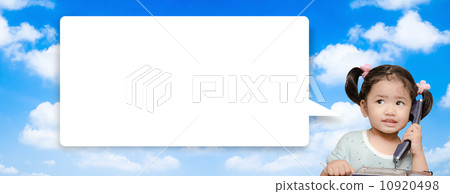 Baby girl talking the phone on blue sky background 10920498