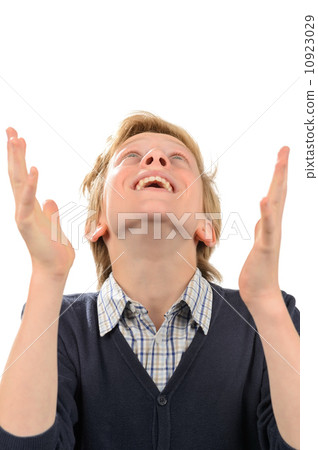 Happy teenage boy praying Happy teenage boy praying 10923029