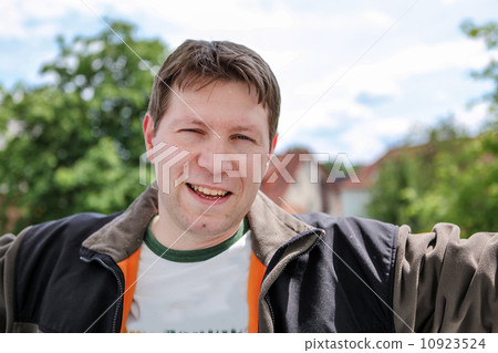 Young beautiful man enjoying spring sun Young beautiful man enjoying spring sun 10923524