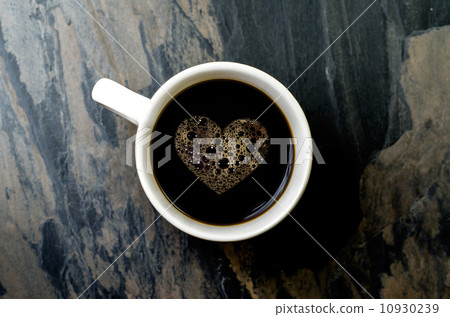 Cup of fresh coffee with heart sign 10930239