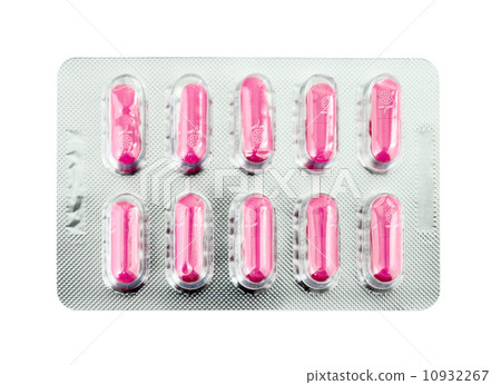 Pink pills pack on white 10932267
