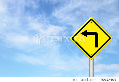 Road Sign - Left Turn Warning with blue sky 10932405