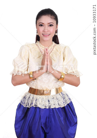 woman wearing typical thai dress pay respect 10933171