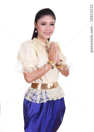 woman wearing typical thai dress pay respect 10933252
