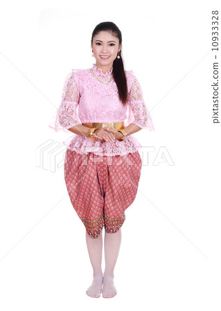 woman wearing typical thai dress isolated on white background woman wearing typical thai dress isolated on white background 10933328