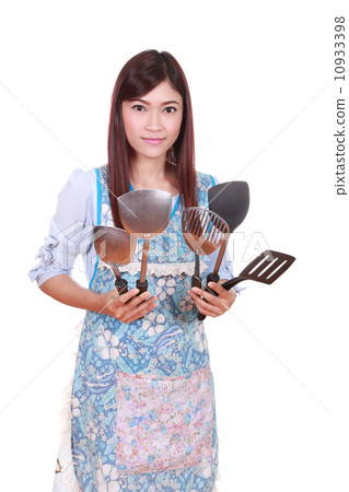 female chef with spade of frying pan female chef with spade of frying pan 10933398
