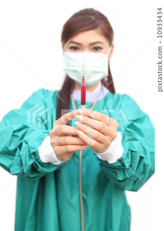 female doctor with syringe female doctor with syringe 10933434