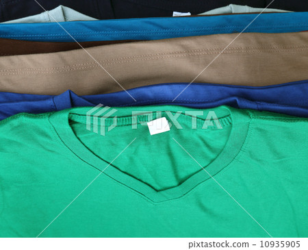 several colorful t-shirts several colorful t-shirts 10935905