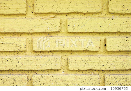 yellow brick wall texture background 10936765
