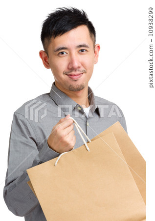 Handsome man with shopping bag 10938299