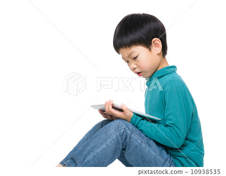 Asian little boy using tablet 10938535