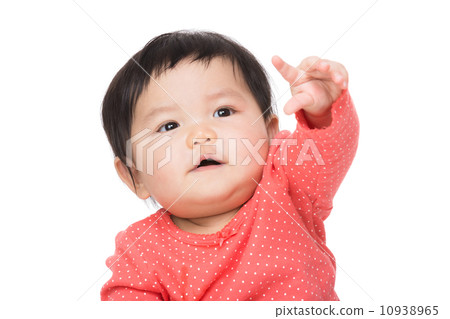 Asian baby girl finger pointing up 10938965