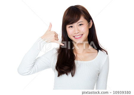 Asia woman making a call me gesture Asia woman making a call me gesture 10939380