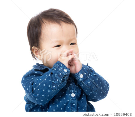 Baby girl put her finger into mouth Baby girl put her finger into mouth 10939408