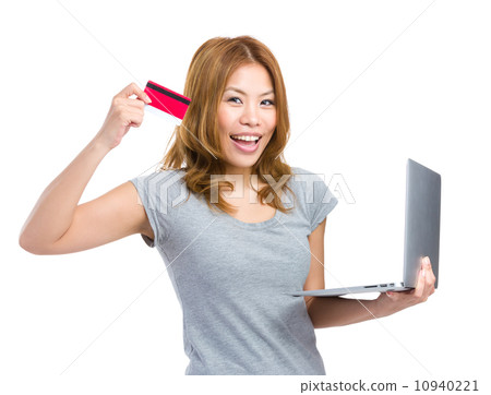 Woman using credit card for onling shopping 10940221