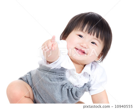 Asian baby girl finger pointing toward front 10940555