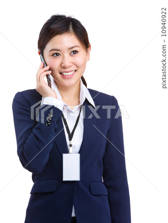 Businesswoman talking to cellphone Businesswoman talking to cellphone 10940922