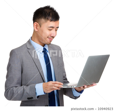 Business man using laptop 10940923