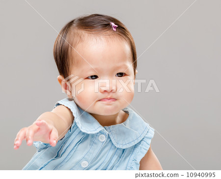 Little girl pulling hand up 10940995