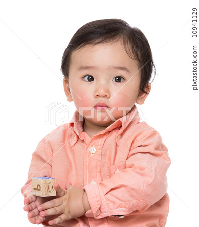 Asian baby boy play with wooden toy block Asian baby boy play with wooden toy block 10941129