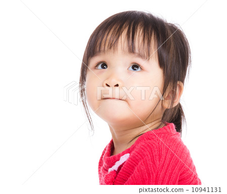 Asia little girl looking up Asia little girl looking up 10941131