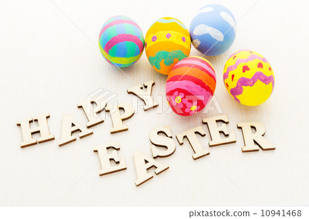 Decorated easter egg with wooden text Decorated easter egg with wooden text 10941468