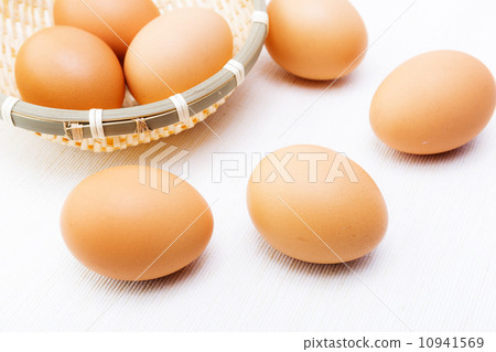 Brown egg over linen background Brown egg over linen background 10941569