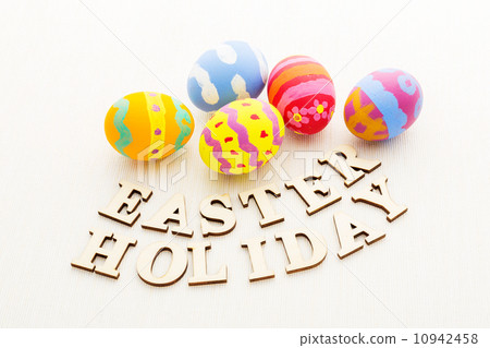 Colourful easter egg with wooden text Colourful easter egg with wooden text 10942458