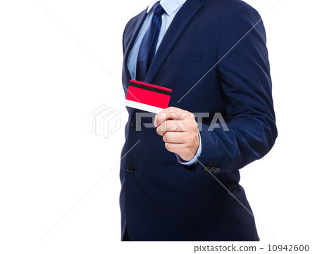 Businessman holding credit card Businessman holding credit card 10942600