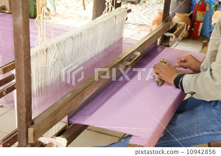 traditional thai loom at work traditional thai loom at work 10942856