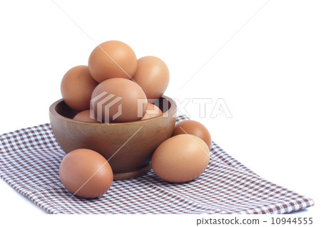 wood bowl with brown eggs wood bowl with brown eggs 10944555
