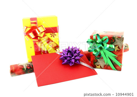 Gift box and roll paper with gift card on white background 10944901