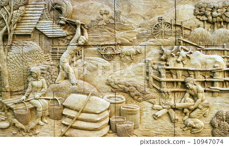 native culture Thai stucco on the stone wall, Thailand native culture Thai stucco on the stone wall, Thailand 10947074