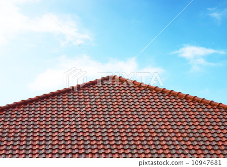 brick roof with clear cloud blue sky 10947681