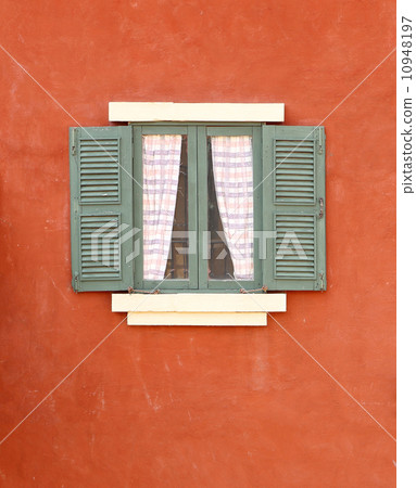 Vintage window on cement wall 10948197