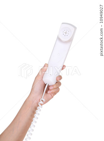 Hand holding white telephone tube Hand holding white telephone tube 10949027