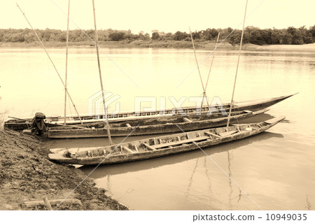wooden boat on Mekong river wooden boat on Mekong river 10949035