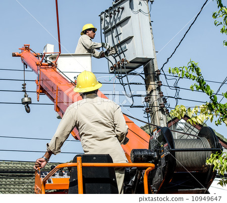 Minburi, Thailand- Nov 9:Electrician are installing high powered Minburi, Thailand- Nov 9:Electrician are installing high powered 10949647