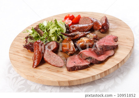 sausages on a wooden cutting board sausages on a wooden cutting board 10951852