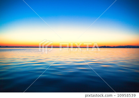 Orange seen in the sunset of Lake Kasumigaura Orange seen in the sunset of Lake Kasumigaura 10958539