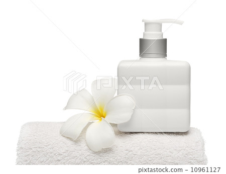 square bottle soap and flower on white towel white background square bottle soap and flower on white towel white background 10961127