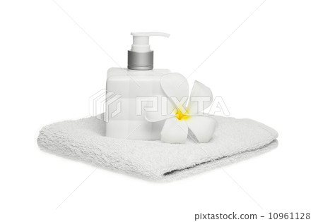 square bottle soap and flower on white towel white background  10961128