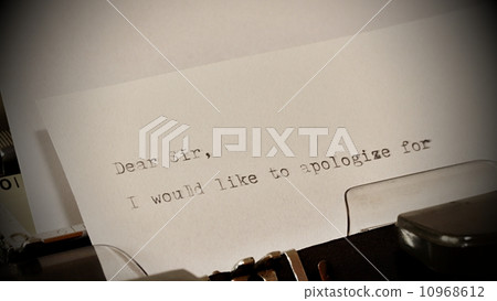 Text Dear Sir typed on old typewriter 10968612