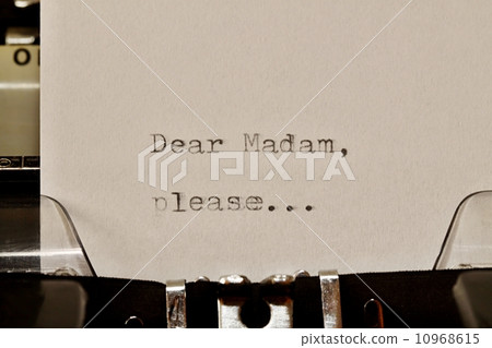 Text Dear madam typed on old typewriter 10968615