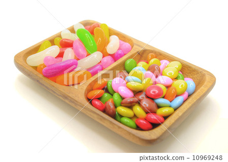 Colorful grain chocolate and sugar confectionery packed in tree vessels 10969248