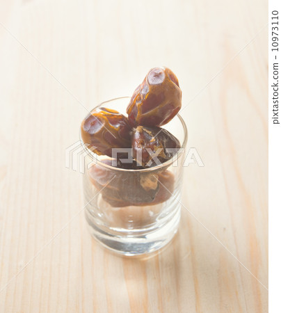 Date palm fruits or kurma, ramadan food vintage retro effect. Date palm fruits or kurma, ramadan food vintage retro effect. 10973110