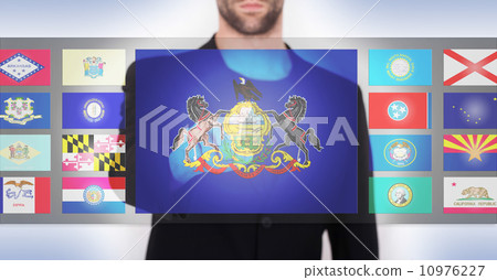 Hand pushing on a touch screen interface Hand pushing on a touch screen interface 10976227